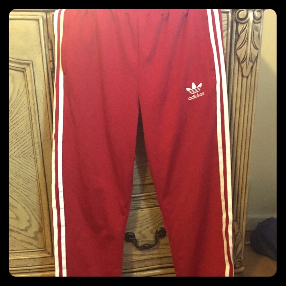 Red Addis’s track pants